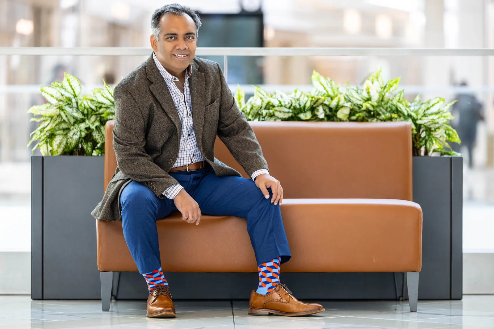 Jigar Desai seated, personal brand portrait