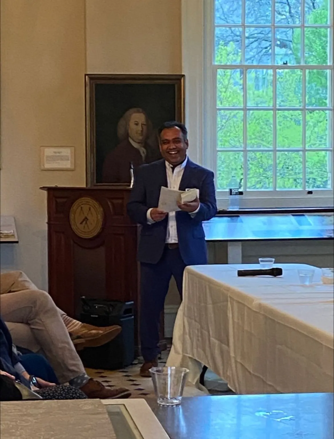 Jigar Desai at podium during AMFP Healthcare Executives Panel Discussion